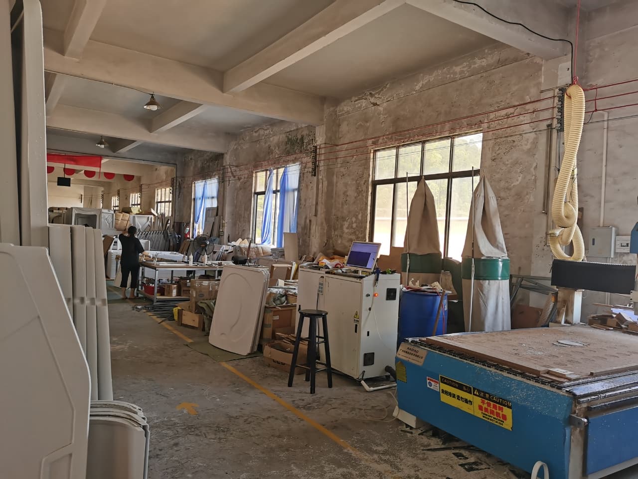 Capsule bed shell components and processing equipment inside a working production facility