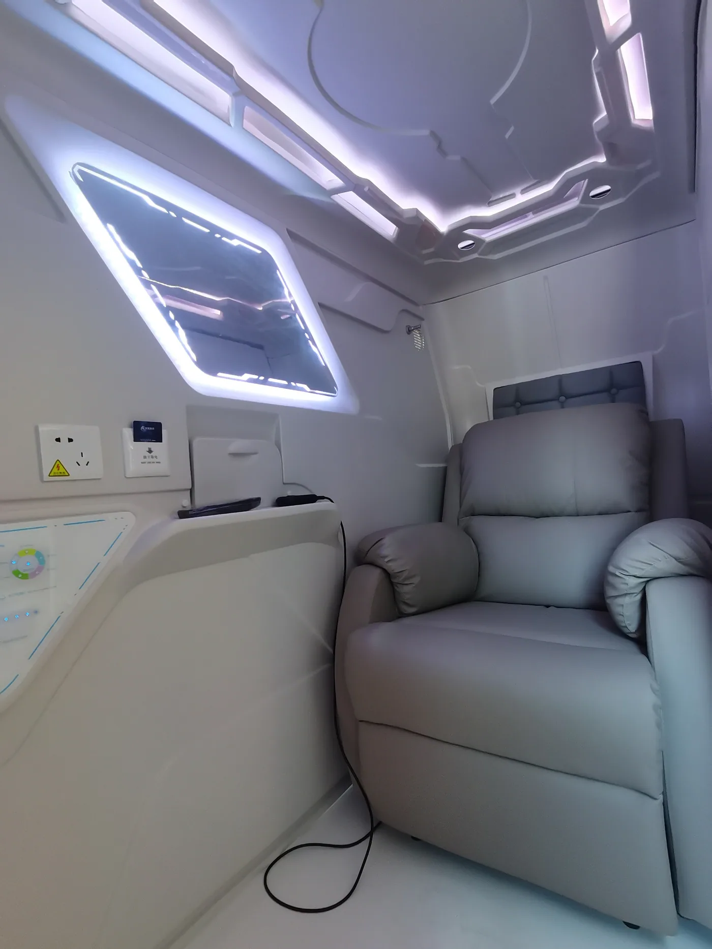 GY80 pod interior configured with a reclining chair